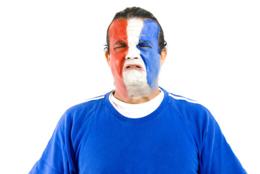 Sad,french,supporter,on,white,background,.