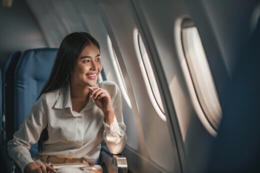 Young,,beautiful,girl,the,passenger,seat,in,a,charter,plane