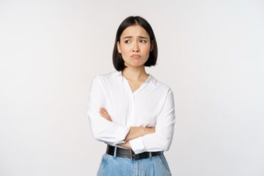 Image,of,sad,office,girl,,asian,woman,sulking,and,frowning