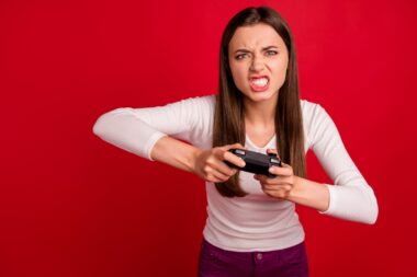 Photo,of,furious,woman,out,of,control,losing,video,game